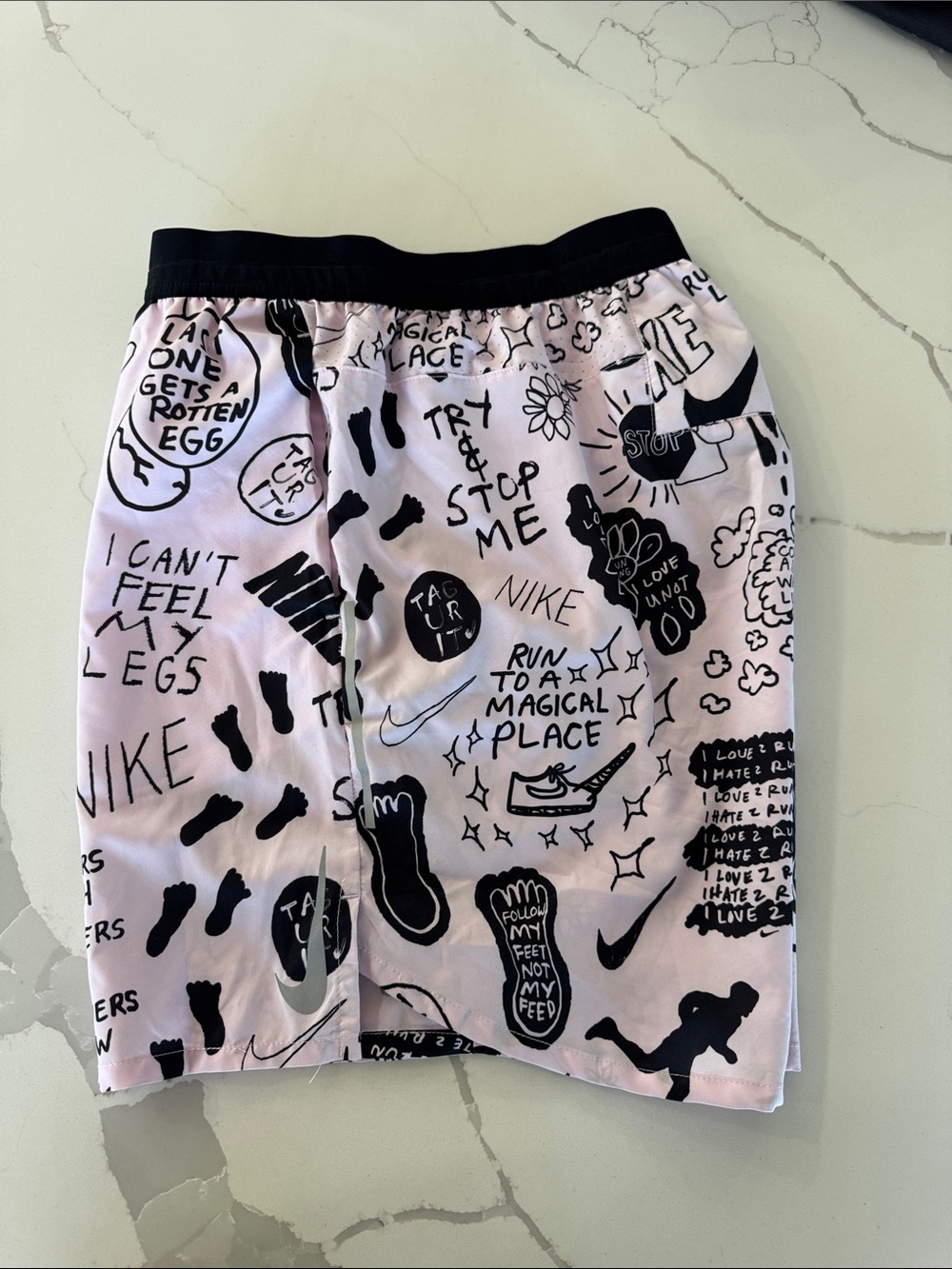 Nike Pink Shorts with Black Graphic Print